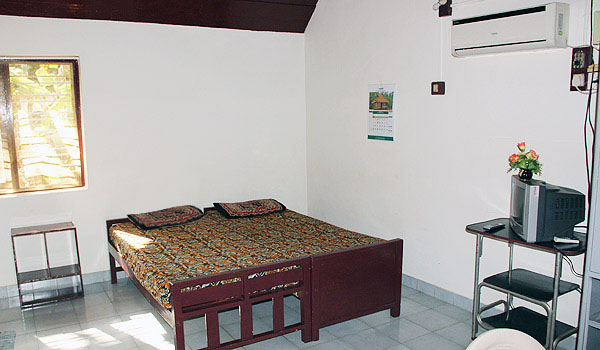 White bedroom in contemporary apartment